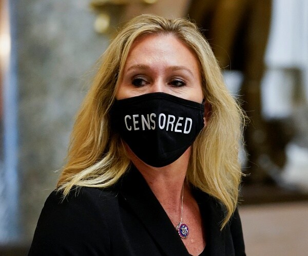 marjorie taylor greene wears censored mask