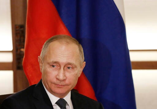 Kremlin Denies Report That Putin Was Involved in DNC Hacks