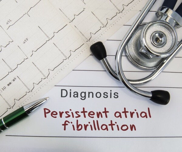 ECG showing A-fib and stethoscope and pad that says "atrial fibrillation"