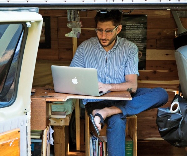 U.S. journalist Danny Fenster works out of his van.