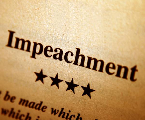 the word impeachment at the top of a page with a definition beneath it