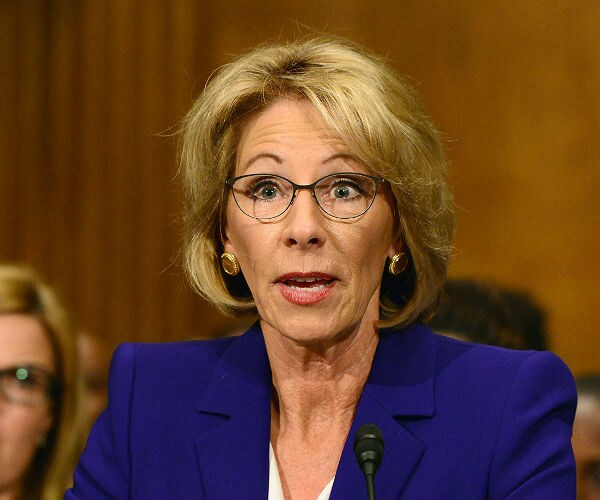 Committee Approves DeVos Nomination for Full Senate Vote