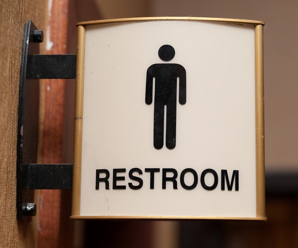 a sign for the men's restroom