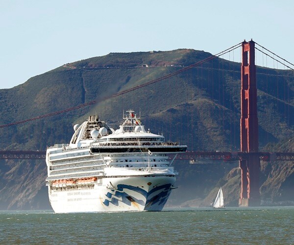 a cruise ship sails into san francisco bay