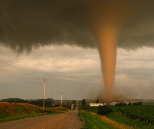 tornado in a rural area at sunset