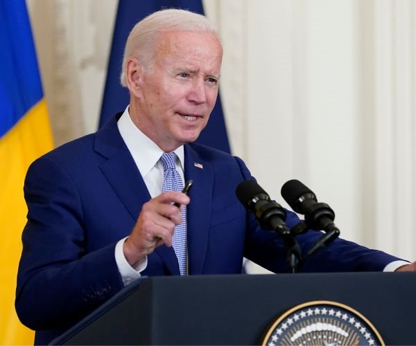Biden to Sign Law Cutting Most Current EV Credits