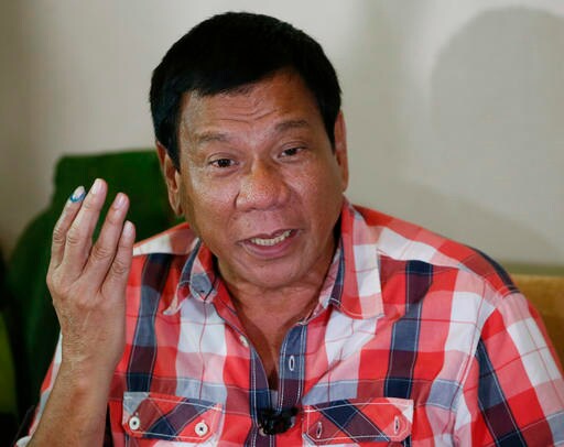 New Philippine Leader Seen as Emancipator, Looming Dictator