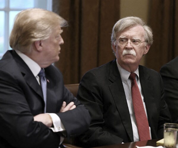 president trump is seen with his former national security adviser john bolton
