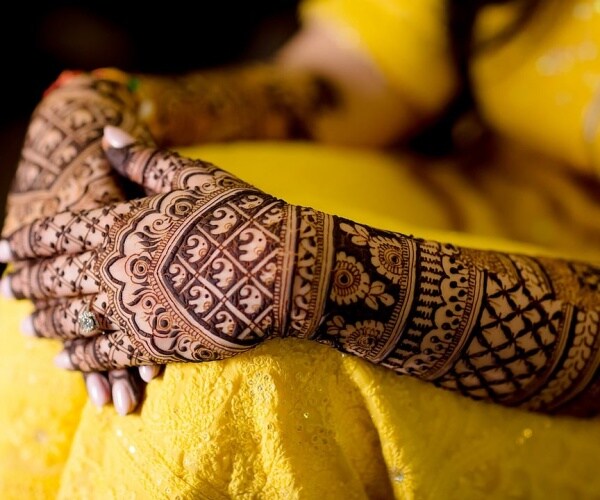 arm with henna tattoo