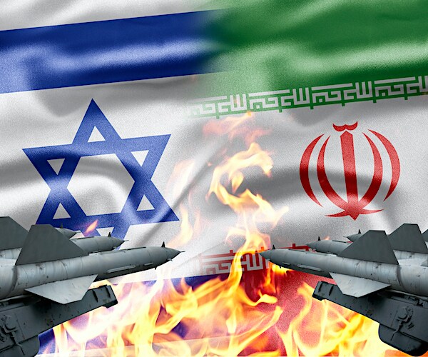 dueling tanks are pointed at opposing israel and iran flags with a fire burning between them