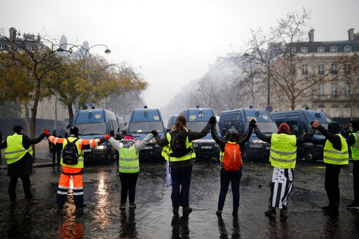 The Latest: French Police Fire Tear Gas at Anti-tax Protest