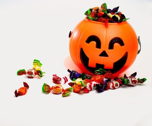 plastic Halloween pumpkin filled with candy