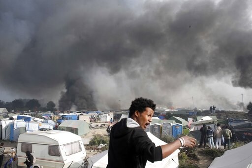 France's Macron in Calais on Foray into Migrant Dilemma