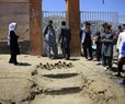 Afghan School Blast Toll Rises to 58, Families Bury Victims