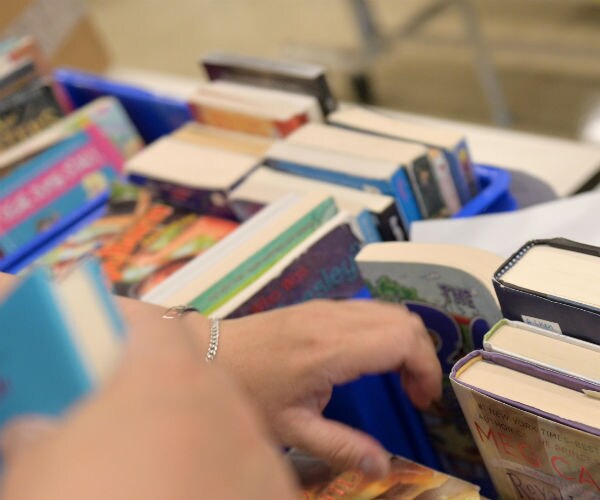 books are shown in blue bins