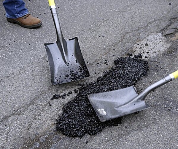 Americans Say They Back Higher Gas Tax to Fix Crumbling Roads