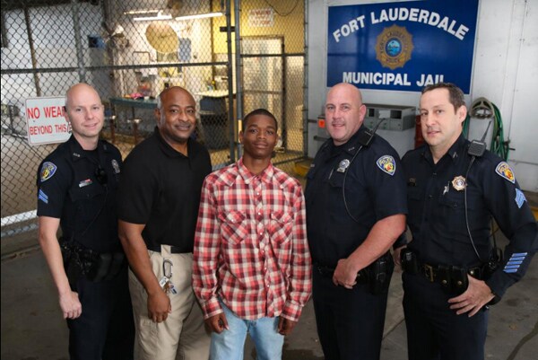 Arrested Teen Saves Officer Who Collapses During Booking (Video)
