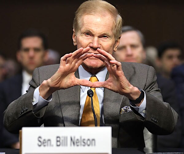 democratic senator bill nelson forms a circle with his hands during a senate committee appearance