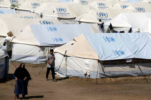 The Latest: Hungary Allows Tougher Asylum-seeker Conditions