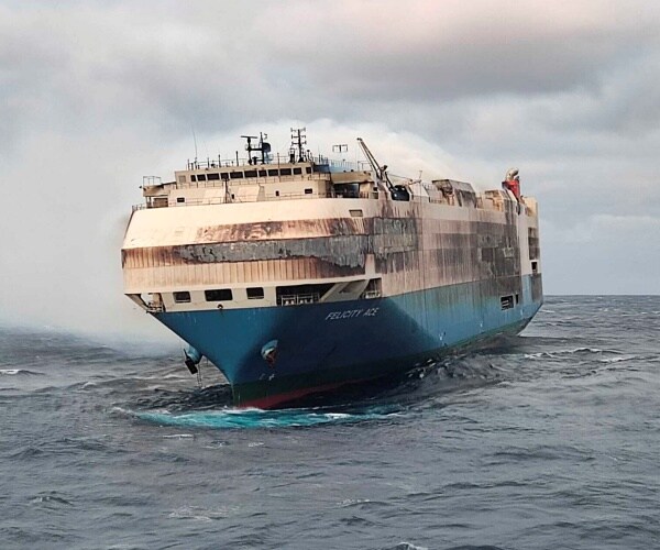 Smoke billows from the burning Felicity Ace car transport ship.