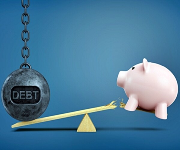 large wrecking ball with debt written on it on seesaw and outweighed by piggy bank that falls from a broken plank

