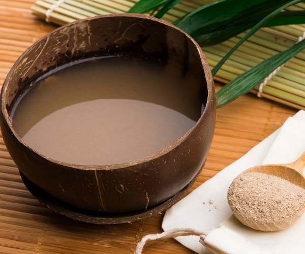 kava powder, in liquid in pot