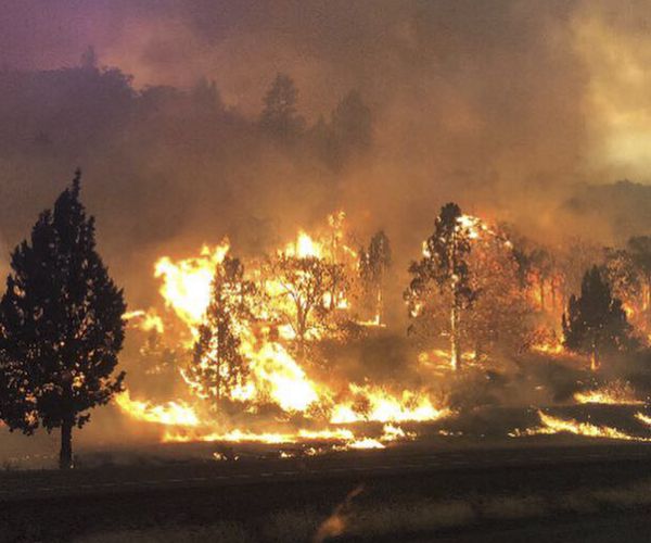 Crews Build Containment around Destructive California Fires