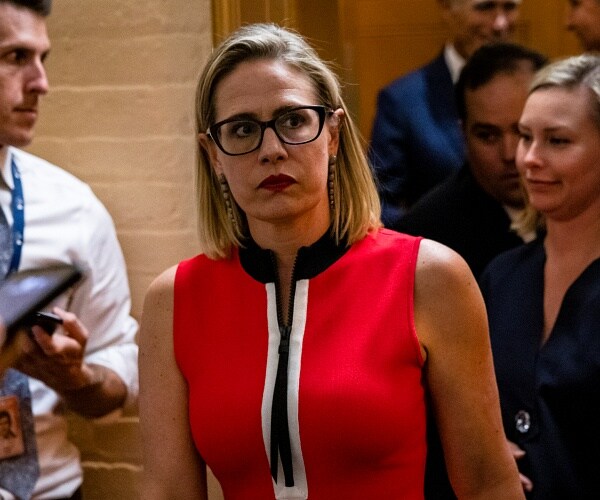 kursten sinema walks through capitol