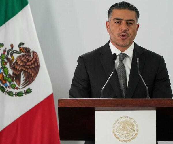 Mexico's security minister said Tuesday that it had sent another 37 members of Mexican drug cartels ...