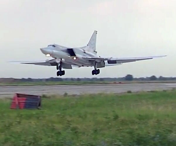 Human Rights Group: Russia Raids on IS Bastion Raqa Kill 24 Civilians