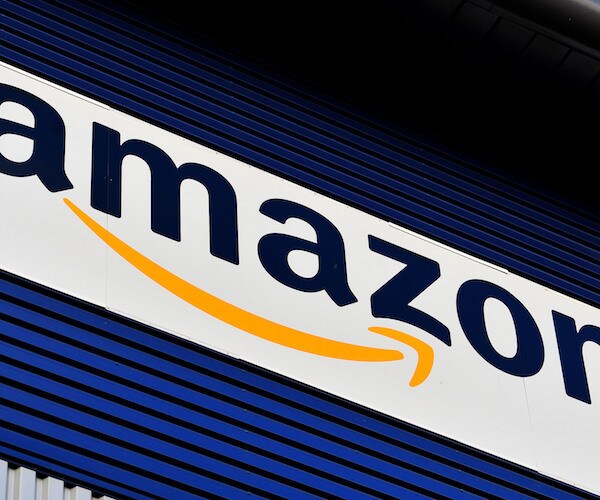amazon's logo is stretched across a graphic
