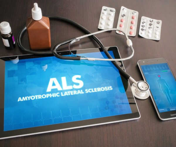 smartphone, iPad with ALS on screen, medications, stethoscope