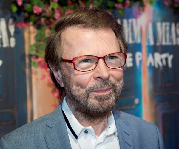Bjorn Ulvaeus smiles for cameras