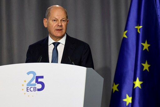 Man Joins VIP Convoy, Hugs German Chancellor; Security Breach under Investigation