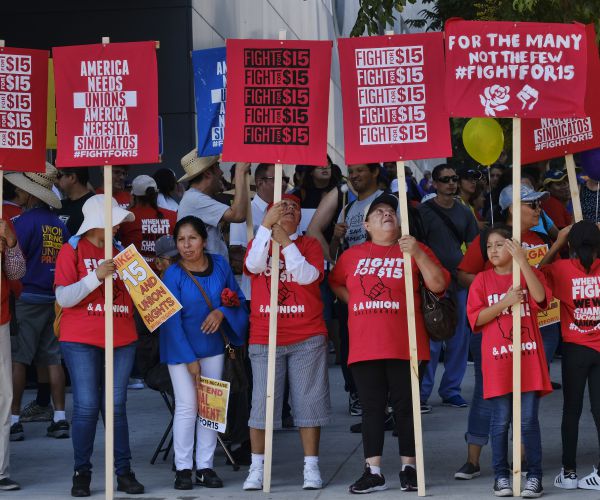 union workers and minimum wage activists gather for a labor day rally in downtown los angeles. 