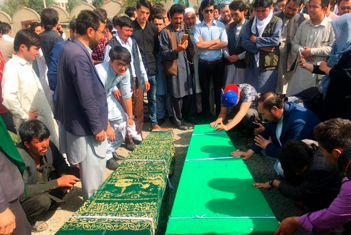 The Latest: Gunmen Besiege Afghan Intel Compound in Kabul