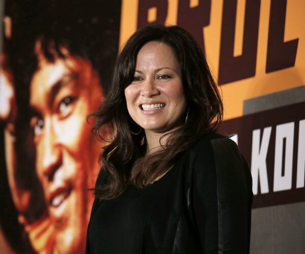 Shannon Lee, daughter of Bruce Lee poses for photographers during a press conference
