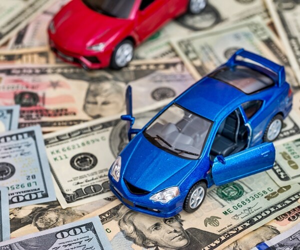 red and blue cars with dollars