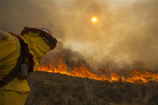 California Wildfire Grows, Weather May Aid Fight