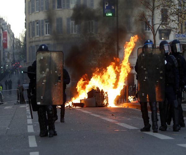 Paris Under Siege: Tear Gas, Fury on the Champs-Elysees