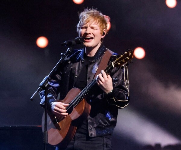 ed sheeran performing on stage