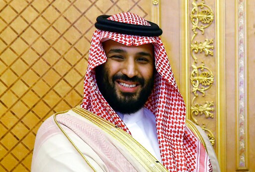 The Latest: Saudi King Swears in New Officials after Arrests
