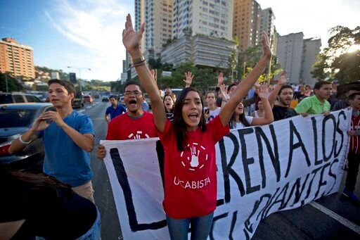 The Latest: Venezuela's Supreme Court Reverses Ruling