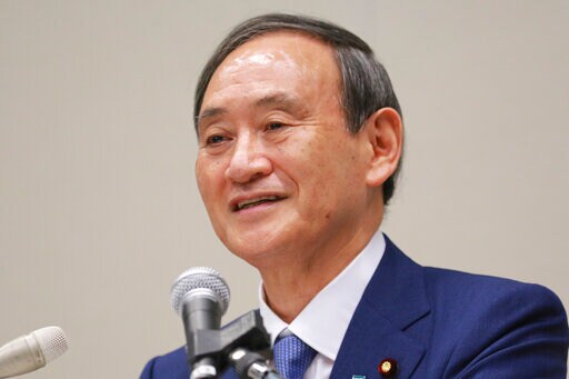 Abe's Assistant and Spokesman Seen as Favorite Successor