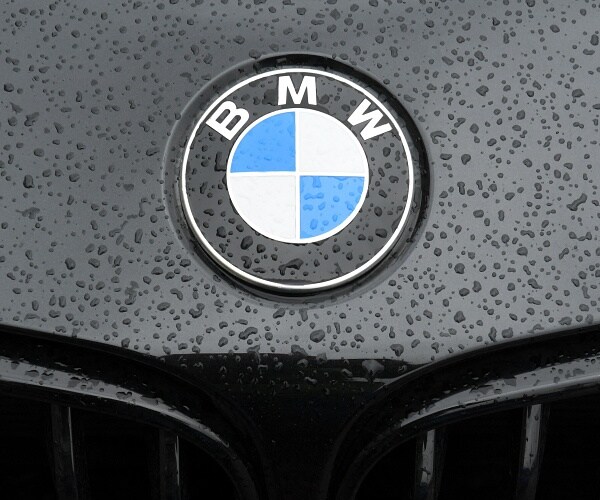 bmw emblem on hood of car
