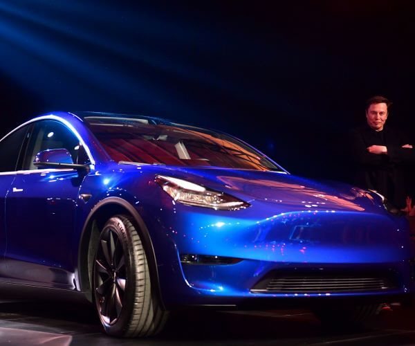 Tesla Reports Record Deliveries But Misses Estimates