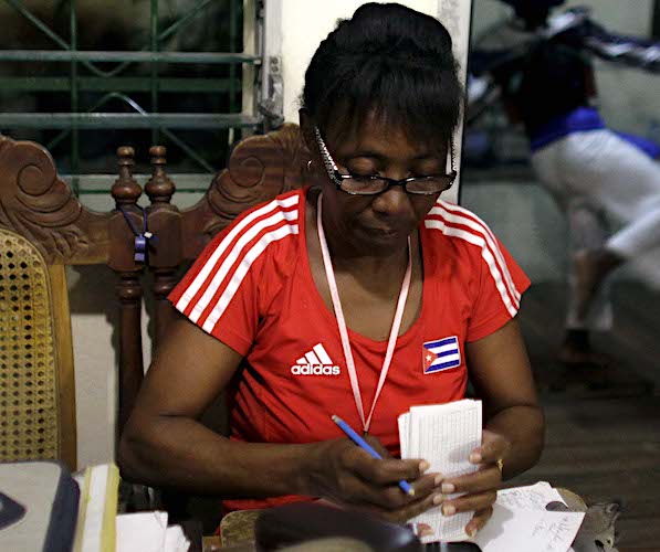 a woman sits at a desk job