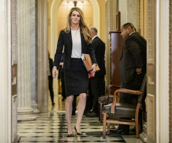 Sen. Kelly Loeffler is shown leaving the senate floor.