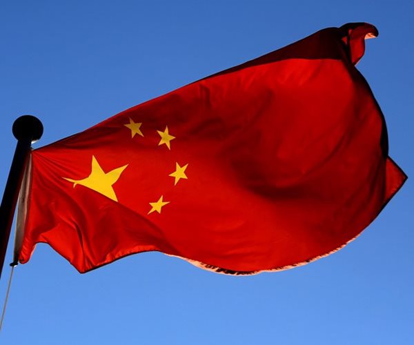 Fitch Cuts China's Ratings to Negative on Growth Risks