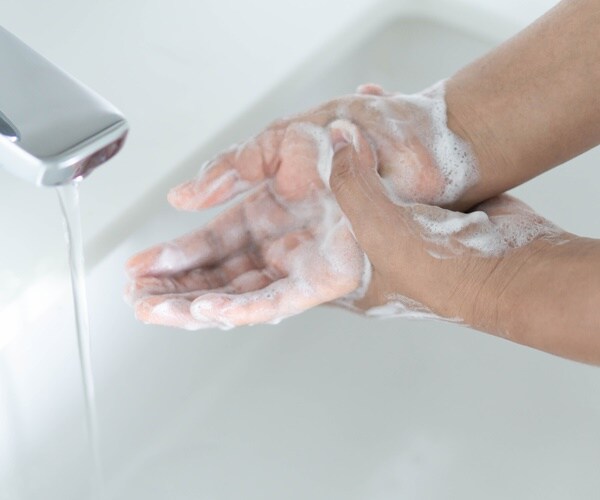 hands washing with soap